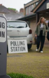 Voters leave a polling station at St Alban's Church, south London, after casting their votes in the local and London Mayoral election Thursday, May 2, 2024.